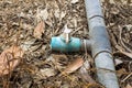 Old spinger and pvc pipe in farmland Royalty Free Stock Photo