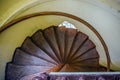 Old spiral metal staircase inside tower, upside view Royalty Free Stock Photo