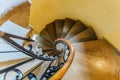 Old spiral metal staircase inside tower, upside view Royalty Free Stock Photo