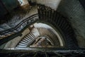 Old spiral staircase at the old abandoned building, top view Royalty Free Stock Photo