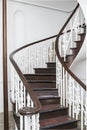 Old spiral staircase with wooden stairs Royalty Free Stock Photo