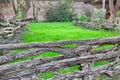 Old Split Log Fence in a Decorative garden Royalty Free Stock Photo