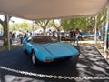 Old sport sky blue 1979 De Tomaso Pantera in park. Nature, trees. Autoclasica 2022 classic car show. Royalty Free Stock Photo