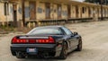 Old sports car on a dusty abandoned street / 1991 Black Acura NSX 5-Speed 3.0L V6 0098