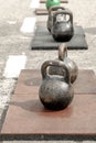 Old sports iron weights stand on the street for training