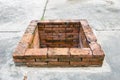 Old square well on concrete background Royalty Free Stock Photo