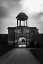 Stable entrance and clock tower in Black and white Attingham park shropshire Royalty Free Stock Photo