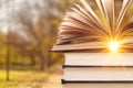 Old stacked books on background