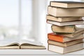 Old stacked books on light background Royalty Free Stock Photo