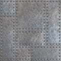 Old stained metal plates with rivets seamless background or texture Royalty Free Stock Photo