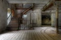 Old staircase in an abandoned hall Royalty Free Stock Photo
