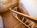 Old staircase in abandoned house of namibian Kolmanskop Ghost Town