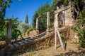 Old staircase in granite and stone pillars and arch gate, typically Mediterranean, inside the gardens at the Solar de Mateus Royalty Free Stock Photo
