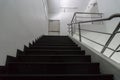Old staircase with a handrail in a building., in the office Royalty Free Stock Photo