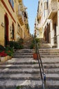Old stairs in European Senglea city in Malta - vertical