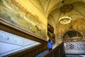 Old stairs and fresco murals on the ceiling and walls inside the Copenhagen City Hall, Denmark. February 2020