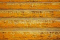 Old stairs painted with yellow paint. Artistic background