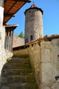 Old stairs to a round tower in a castle Royalty Free Stock Photo