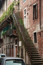 old stairs to the third floor full of vegetation Royalty Free Stock Photo