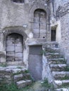 Old stairs to wooden doors in Italian Village