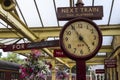 Old station clock on platform of Keighley Station, Worth Valley Railway. Yorkshire, England, UK, Royalty Free Stock Photo