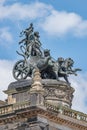 Old statue of Dionis and Aridna quadriga with four panthers on the top of the State Opera House in downtown of Dresden, Germany,