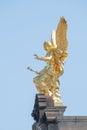 Old statue of a golden angel as a warrior and defender at the dome top of the central historical building in downtown of Dresden, Royalty Free Stock Photo