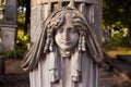 Old statue on grave in the Lychakiv cemetery of Lviv, Ukraine Royalty Free Stock Photo