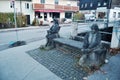 Old statue man local man and woman beside road outdoor of alley street at Pfunds village valley hill on November 4, 2016 in Tyrol Royalty Free Stock Photo