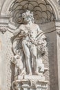 Old statue of a sensual Baroque Era man in downtown of Dresden, Germany, details, closeup Royalty Free Stock Photo