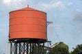 Old steam engine iron train water tank Royalty Free Stock Photo