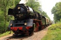 Old steam engine locomotive on track Royalty Free Stock Photo