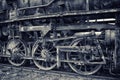 Old steam  engine on the railways - detail of wheels Royalty Free Stock Photo