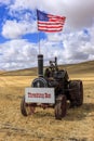 Old steam engine with US flag. Royalty Free Stock Photo