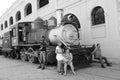 A old steam locomotive in front of the harbour building in Havanna