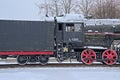 Old steam locomotive in the snow in Tapa station