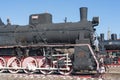 Old steam locomotive, steam transport, retro steam locomotive. The technique to which humanity owes its progress Royalty Free Stock Photo