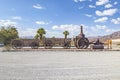 Old steam tractor and wagons serving the mine road in the death valley for Borate mining Royalty Free Stock Photo