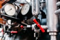 Old steam train cabine, valves, pipes closeup Royalty Free Stock Photo