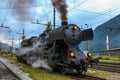 Old steam train engine letting off the steam Royalty Free Stock Photo