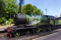 Old steam train fired up and ready to go Royalty Free Stock Photo