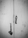 Old steel cabinet with the chain and key in black and white color mode Royalty Free Stock Photo