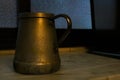 Old steel coffee pot on kitchen counter