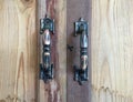 Old steel handles on wooden cupboard Royalty Free Stock Photo