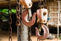 Old steel hook with hanging chain suspended Royalty Free Stock Photo