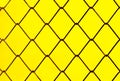 Old steel mesh texture in seamless  patterns on yellow colorful background Royalty Free Stock Photo