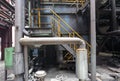 Old steel mill with pipes and valves. Royalty Free Stock Photo