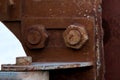 Old steel nut and rusty fixed steel pole Royalty Free Stock Photo