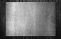 Old steel plate on black wooden plank background texture. 3d illustration Royalty Free Stock Photo