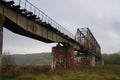Old steel riveted and forgotten bridge Royalty Free Stock Photo